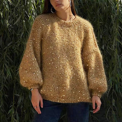 A model wearing a loose-fitting sequin mohair sweater with lantern sleeves and an O-neck design. Golden Atelier 4