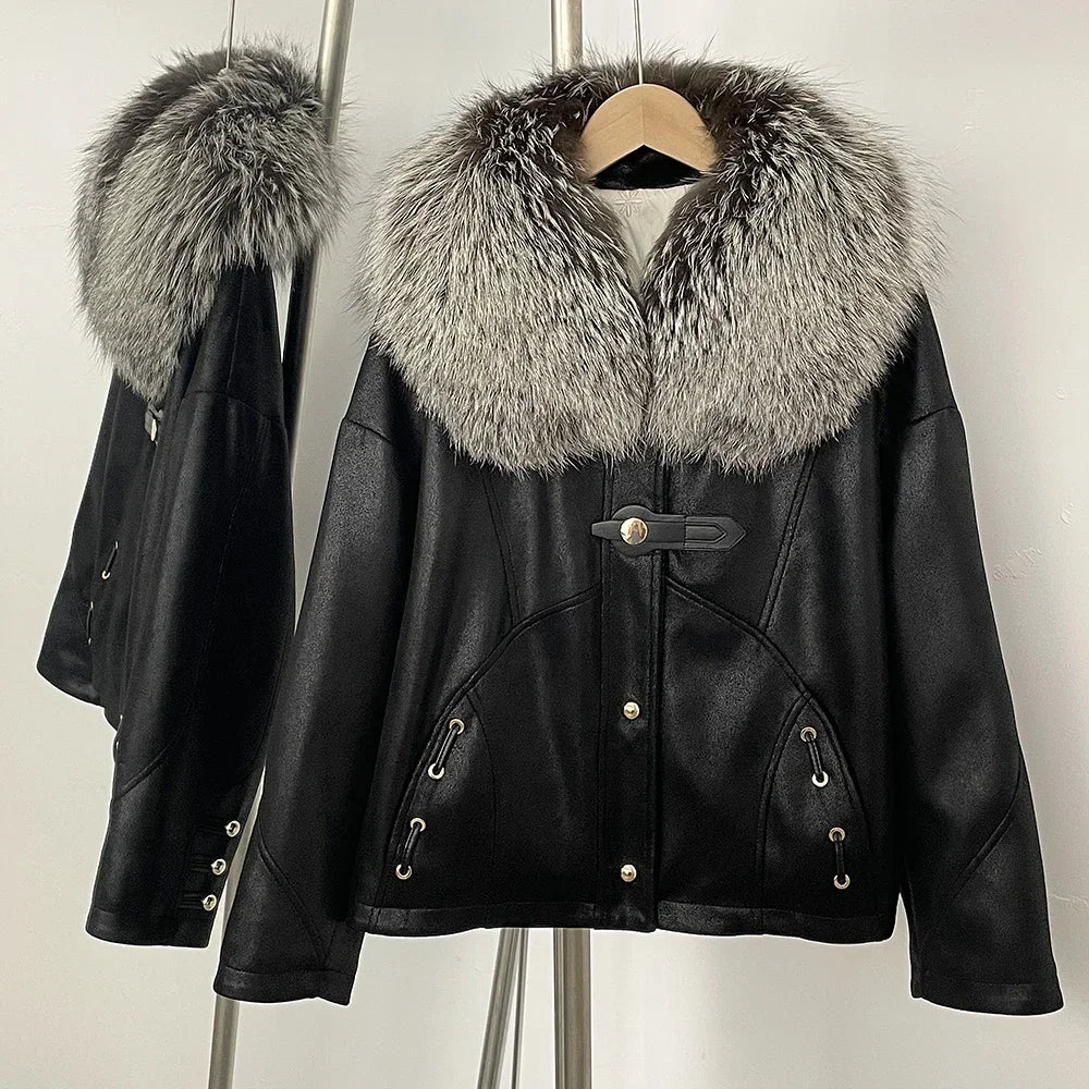 Black leather jacket with fur collar on a hanger against a white background