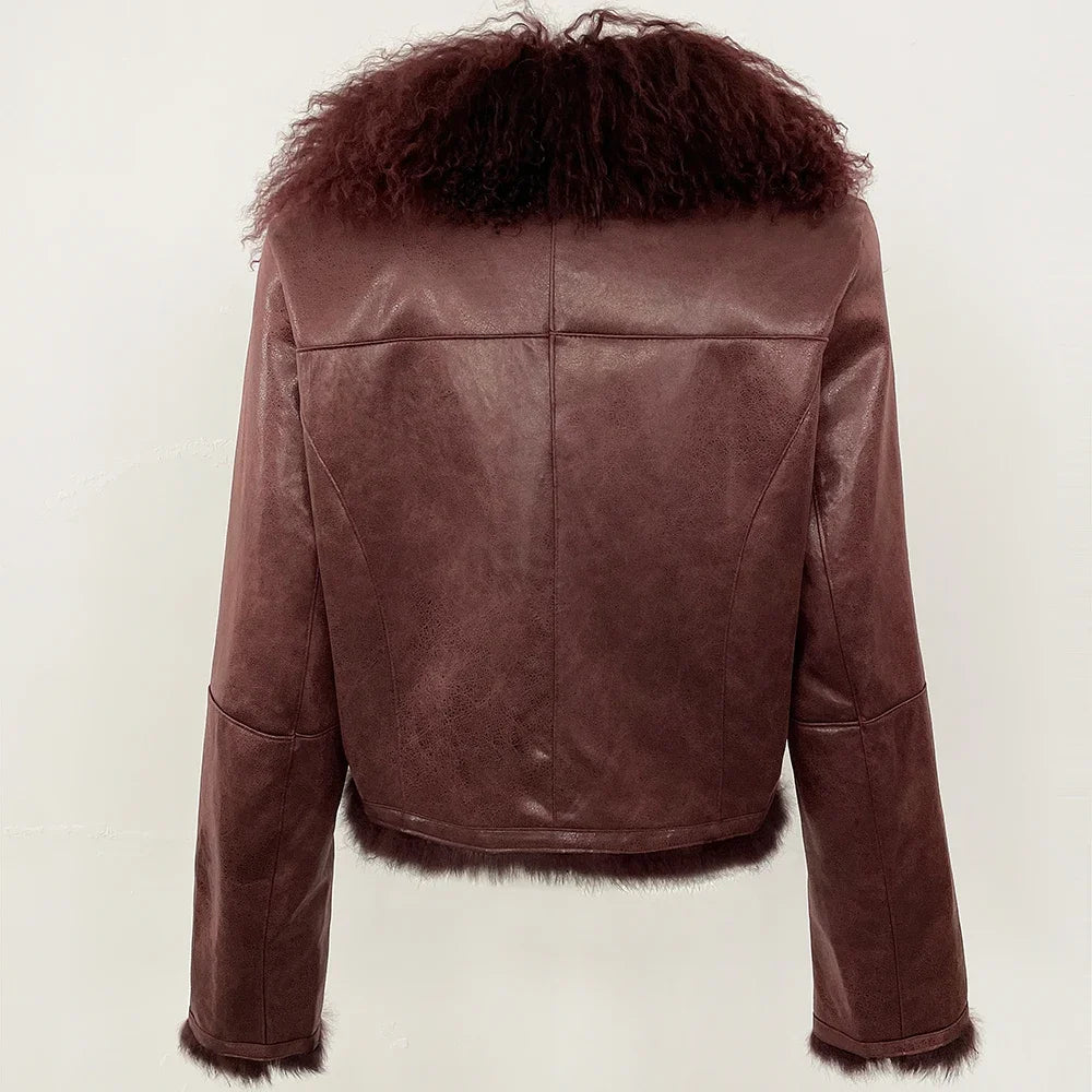Brown leather jacket with fur trim on a light beige background