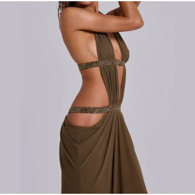 Brown evening gown with cut-out design on a plain background