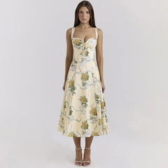 Woman wearing a floral dress on a plain background