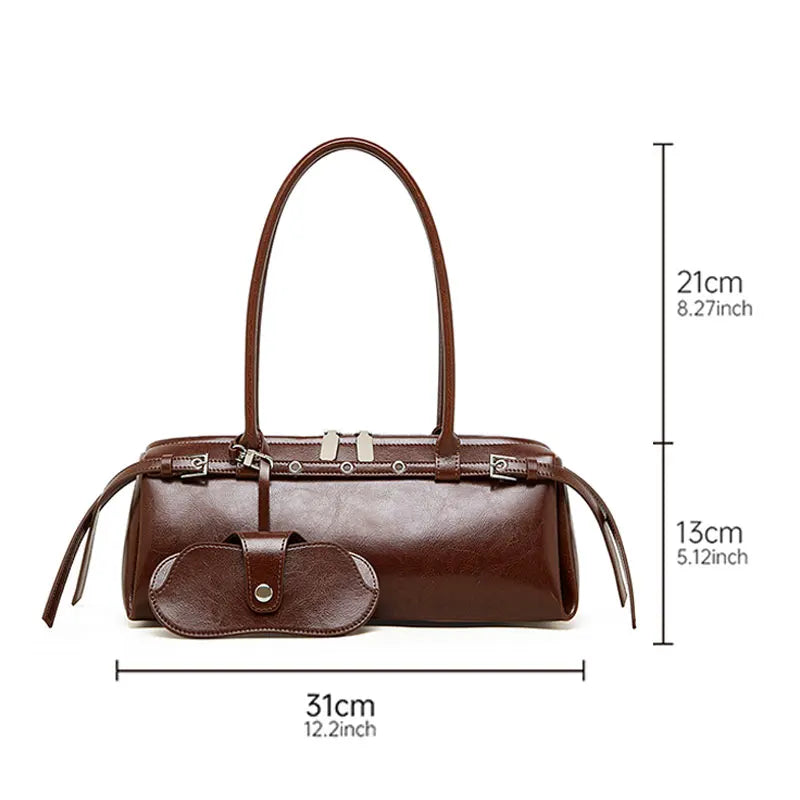 Brown handbag with measurements on a white background