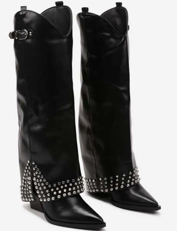 Black leather knee-high boots with pointed toe, silver stud embellishments, and buckle detail