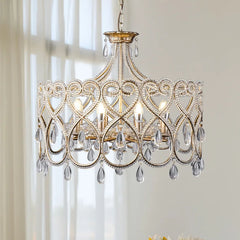 Decorative chandelier with crystal accents hanging in a room.
