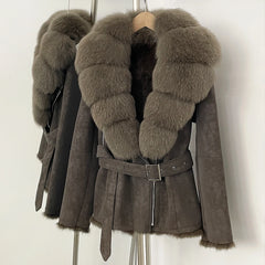 Side view of the belted suede jacket, showcasing the silhouette and fur details.