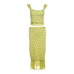 Yellow polka dot two-piece set on a white background