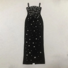 Flat lay of black embellished column gown