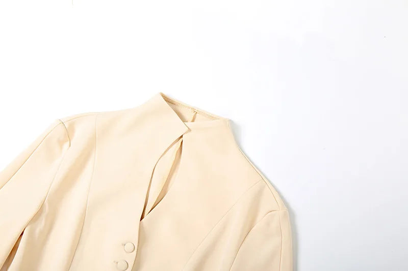 Beige blazer on a white background