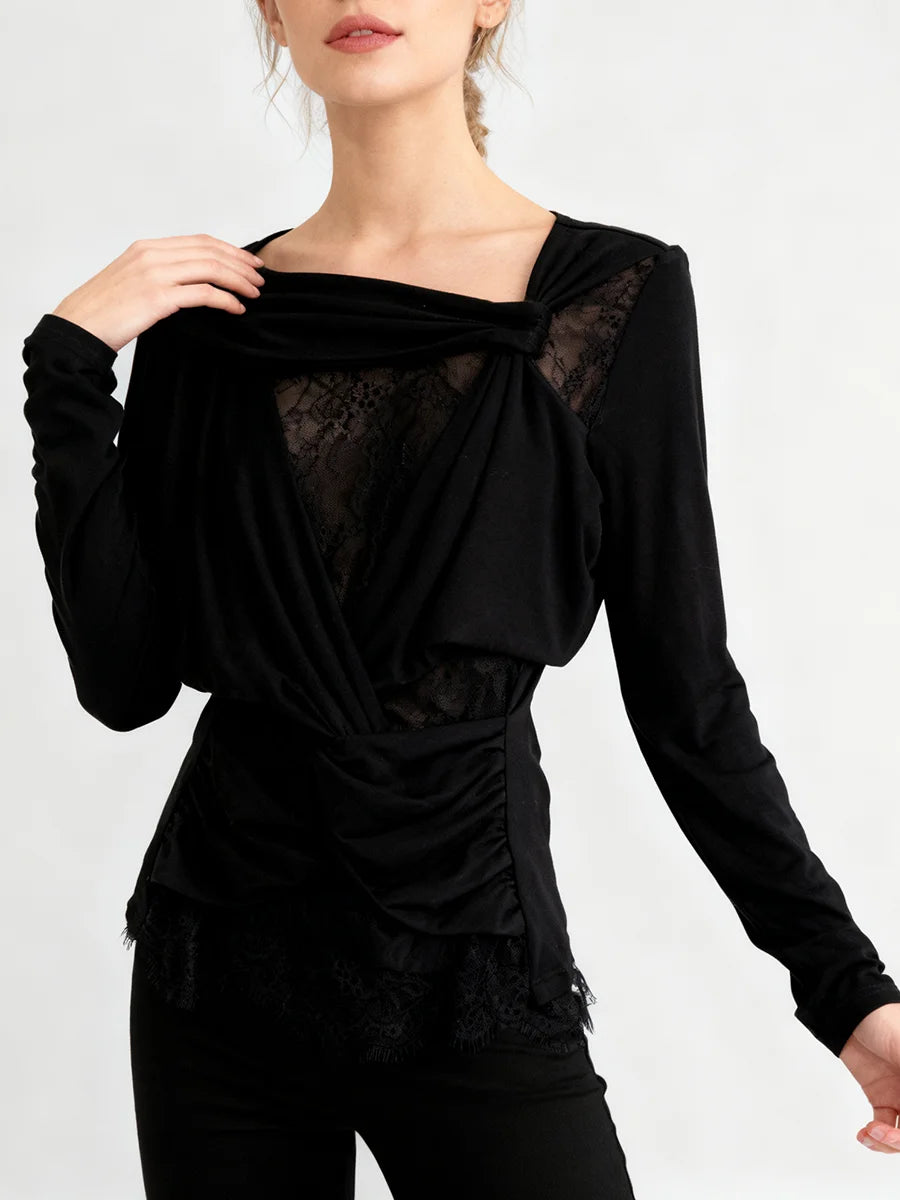 Black long-sleeve top with lace details on a white background