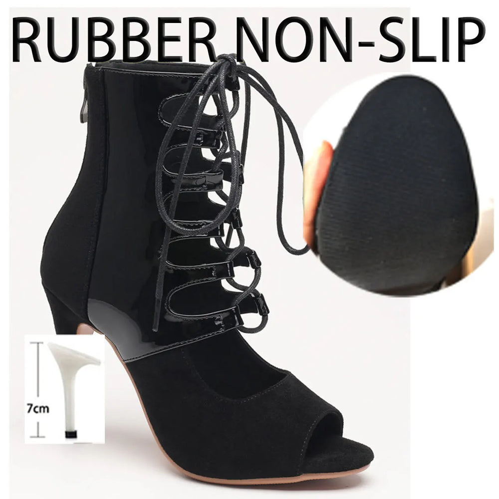 Black high-heeled shoes with lace-up design and non-slip rubber sole on a white background.