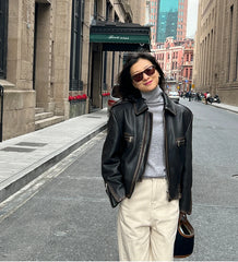 A woman wearing a stylish faux shearling jacket, perfect for spring. Golden Atelier 2