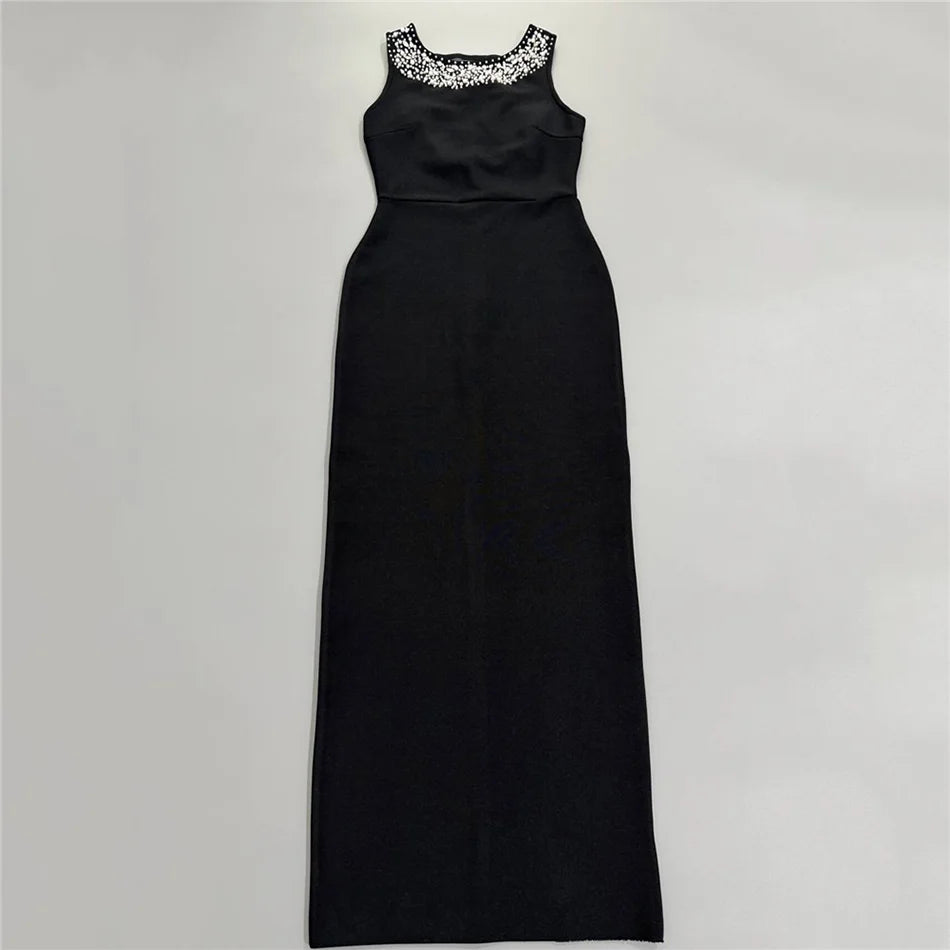 Black sleeveless maxi dress laid flat