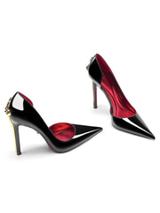 Black high-heeled shoes with red interior on a white background