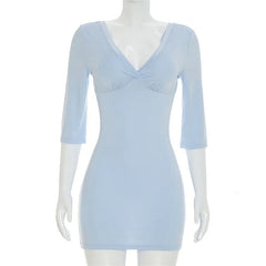 Light blue dress on a mannequin against a white background