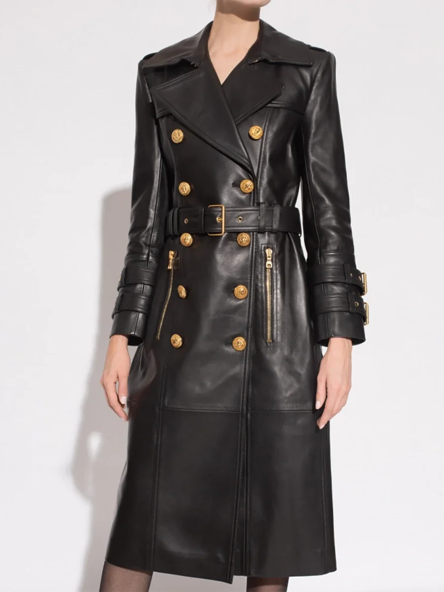 Elegant faux leather coat styled with waist belt

