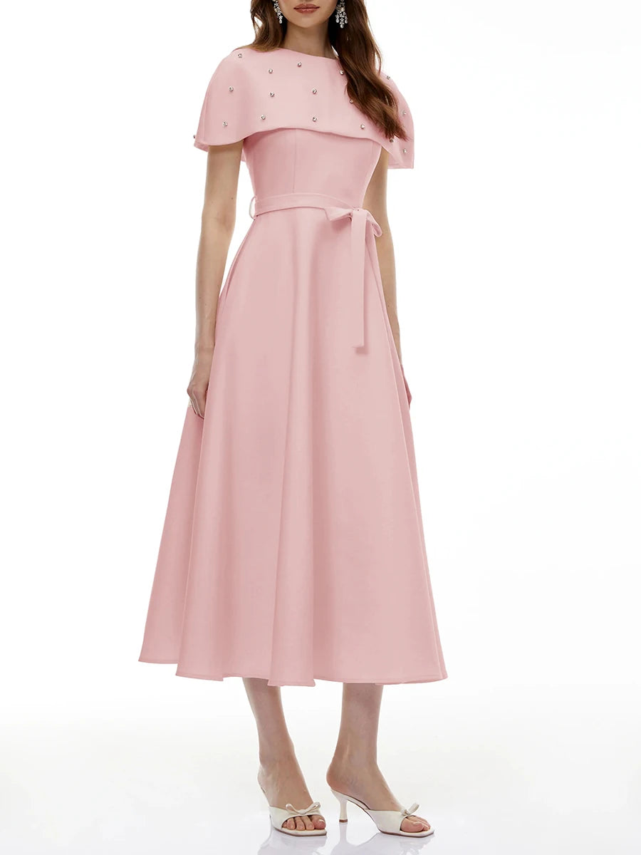 Full view of a pink midi dress with a sash belt