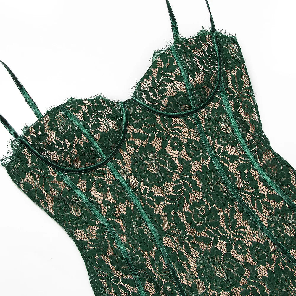 Close-up of green floral lace fabric on midi dress