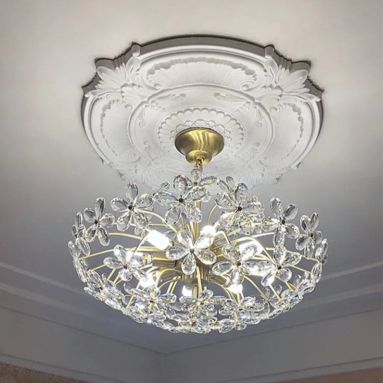 Modern crystal flower flush mount chandelier with cut-glass petals and stainless steel in elegant interior