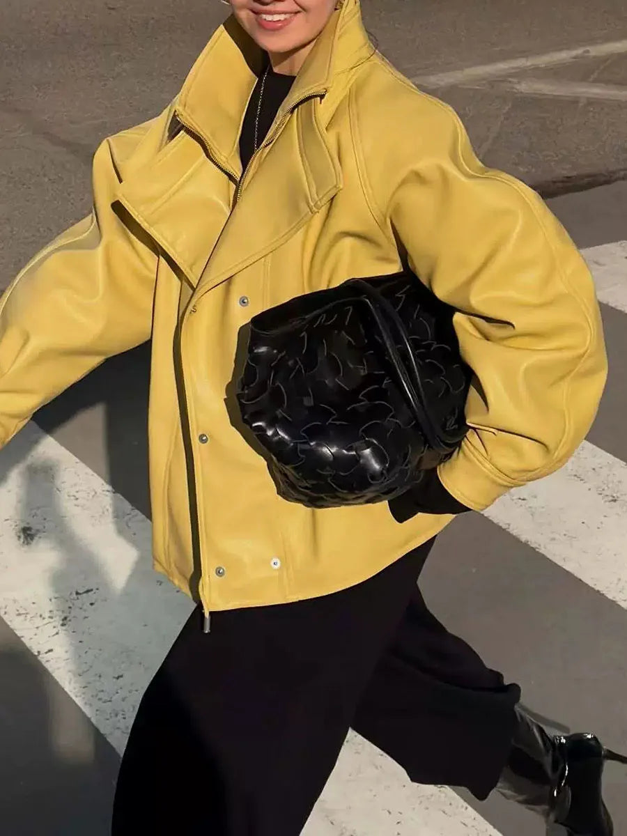 Model wearing yellow stand collar drawstring jacket