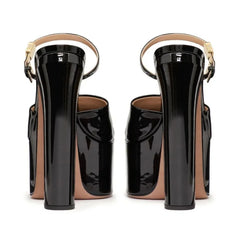 Black high-heeled shoes with tan accents