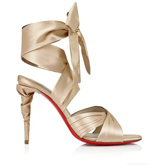Champagne satin lace up heeled sandals with twisted heel