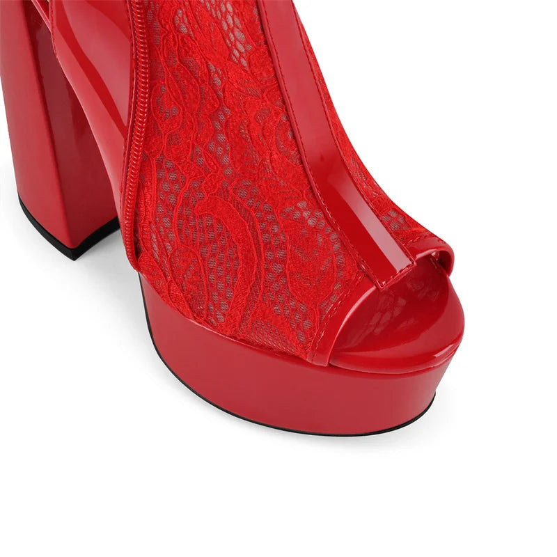 Close-up of lace detail on red peep toe platform block heel boots