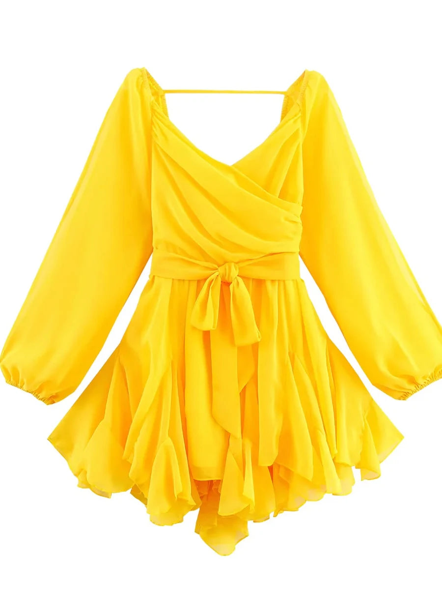 Yellow dress with long sleeves on a white background