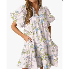 Woman wearing a floral dress on a white background