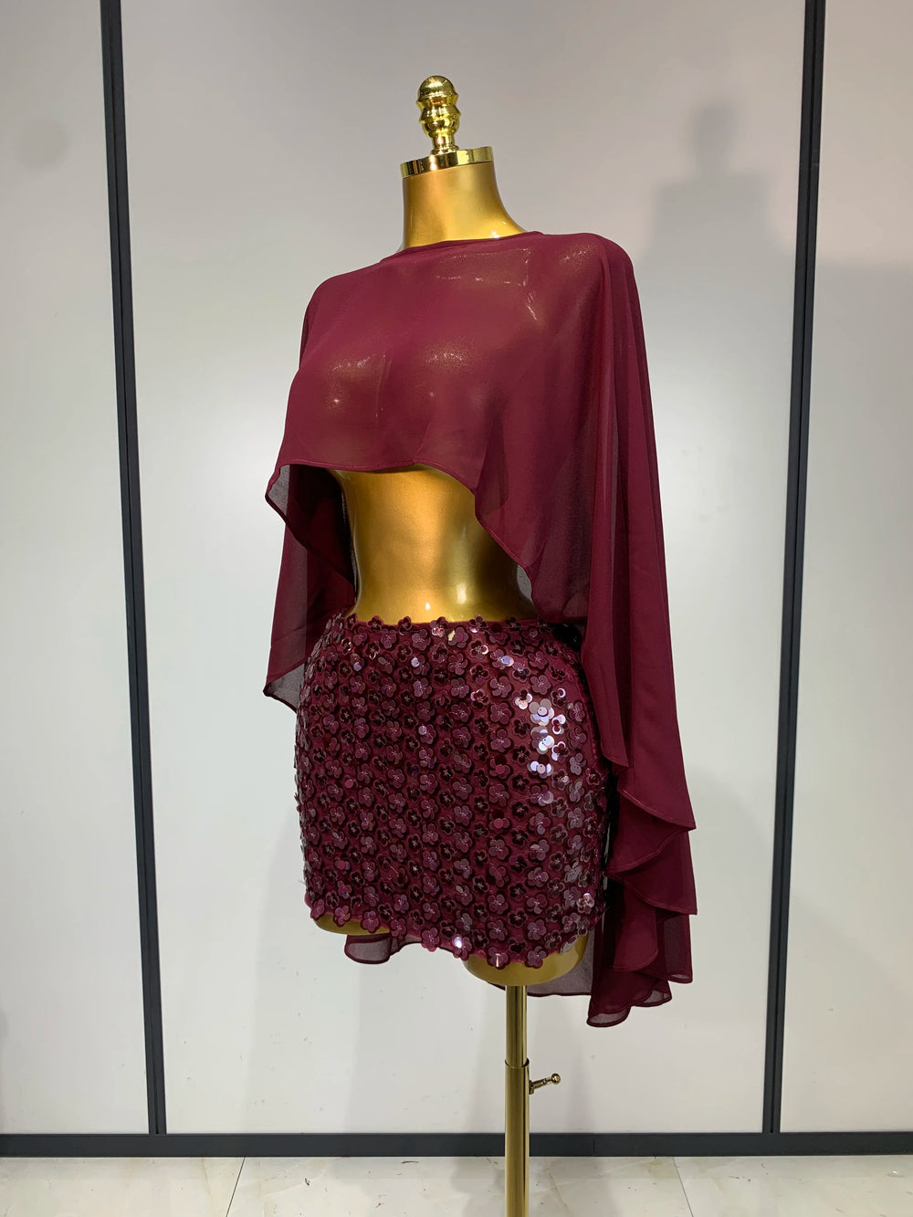 Burgundy two-piece set with sequin skirt and chiffon overlay