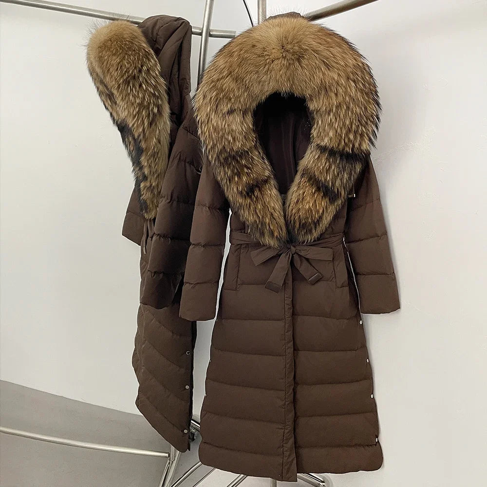 Brown puffer coat with fur hood on a white background