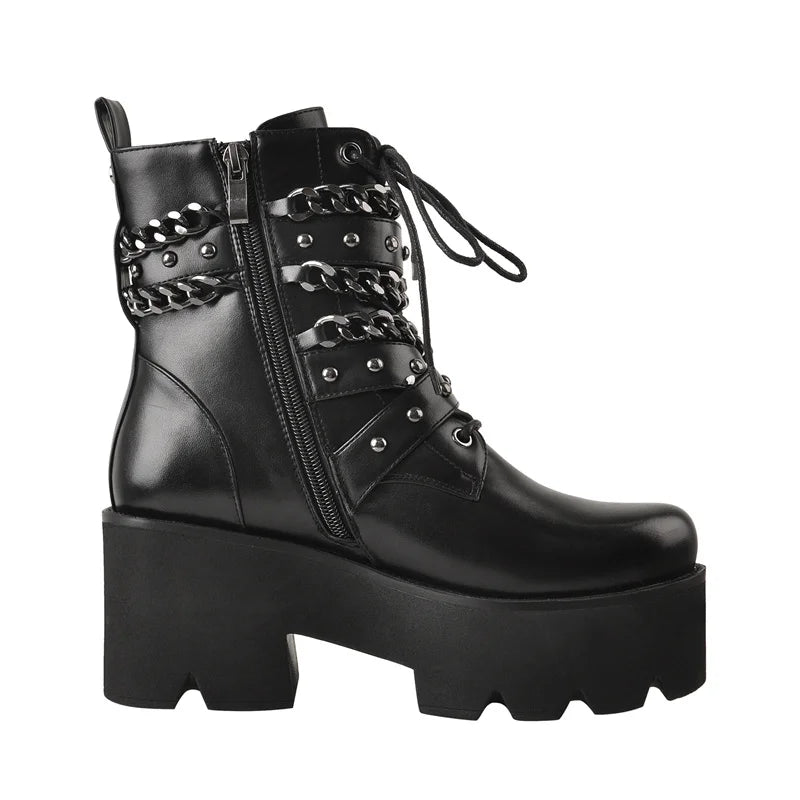 Side view of black chunky platform chain detail ankle boots