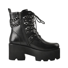 Side view of black chunky platform chain detail ankle boots