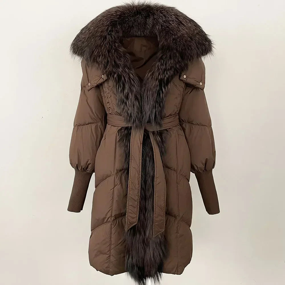 Brown puffer coat with fur hood and belt on a white background