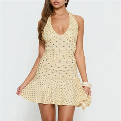 Polka dot halter neck mini dress with flared hem