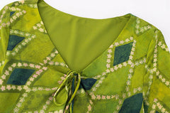 Close-up of the V-neck and tie-front detail on the midi dress.