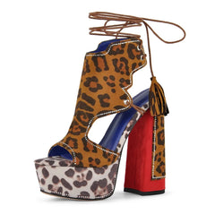 Leopard print lace-up platform sandals with a chunky block heel.