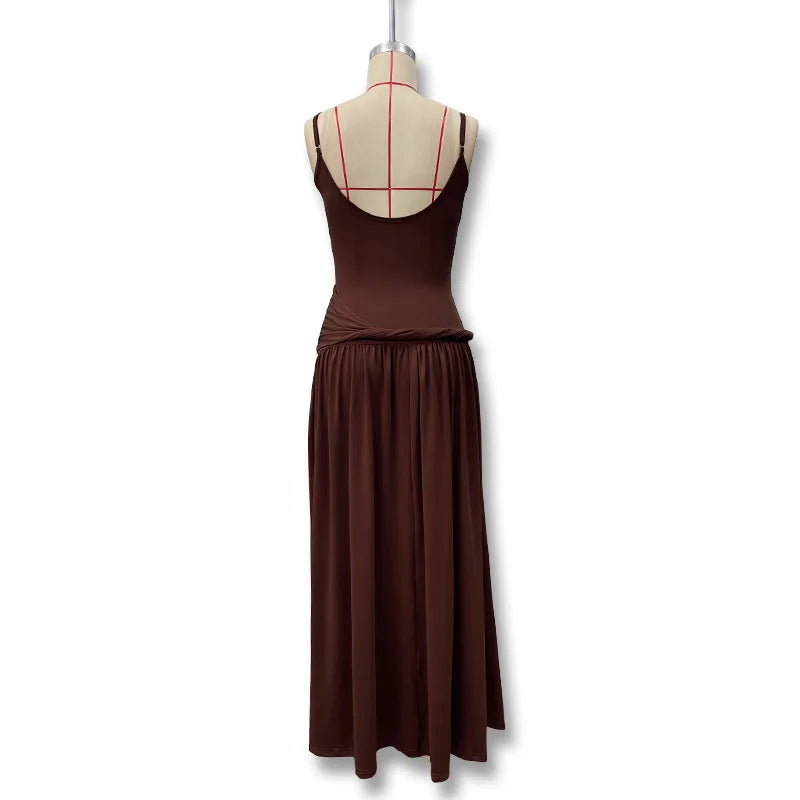 Brown dress on a mannequin against a white background