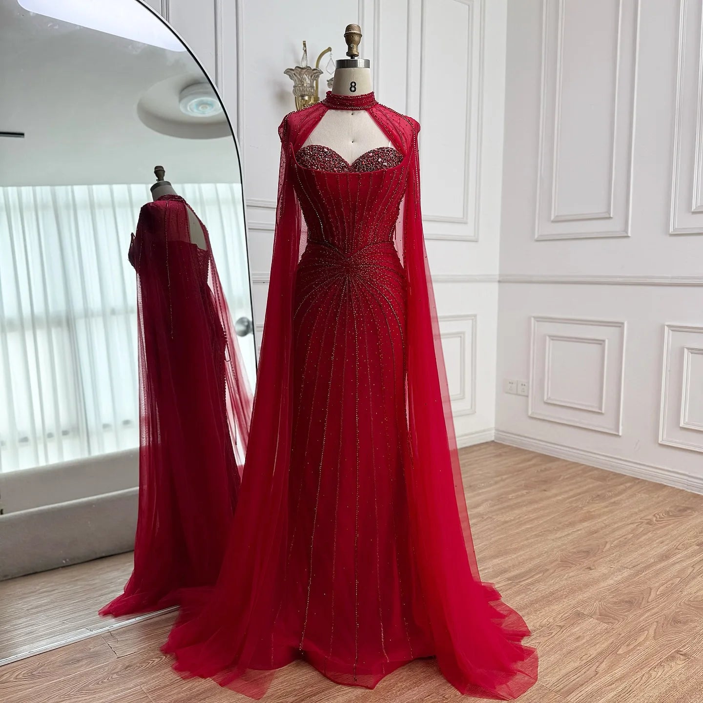  Strapless evening gown with sheer tulle cape overlay and floor-length design — elegant couture look for formal galas and red carpet events

