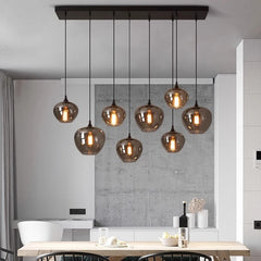  Sleek and minimalist LED pendant light hanging in a modern dining room setting , Golden Atelier 4