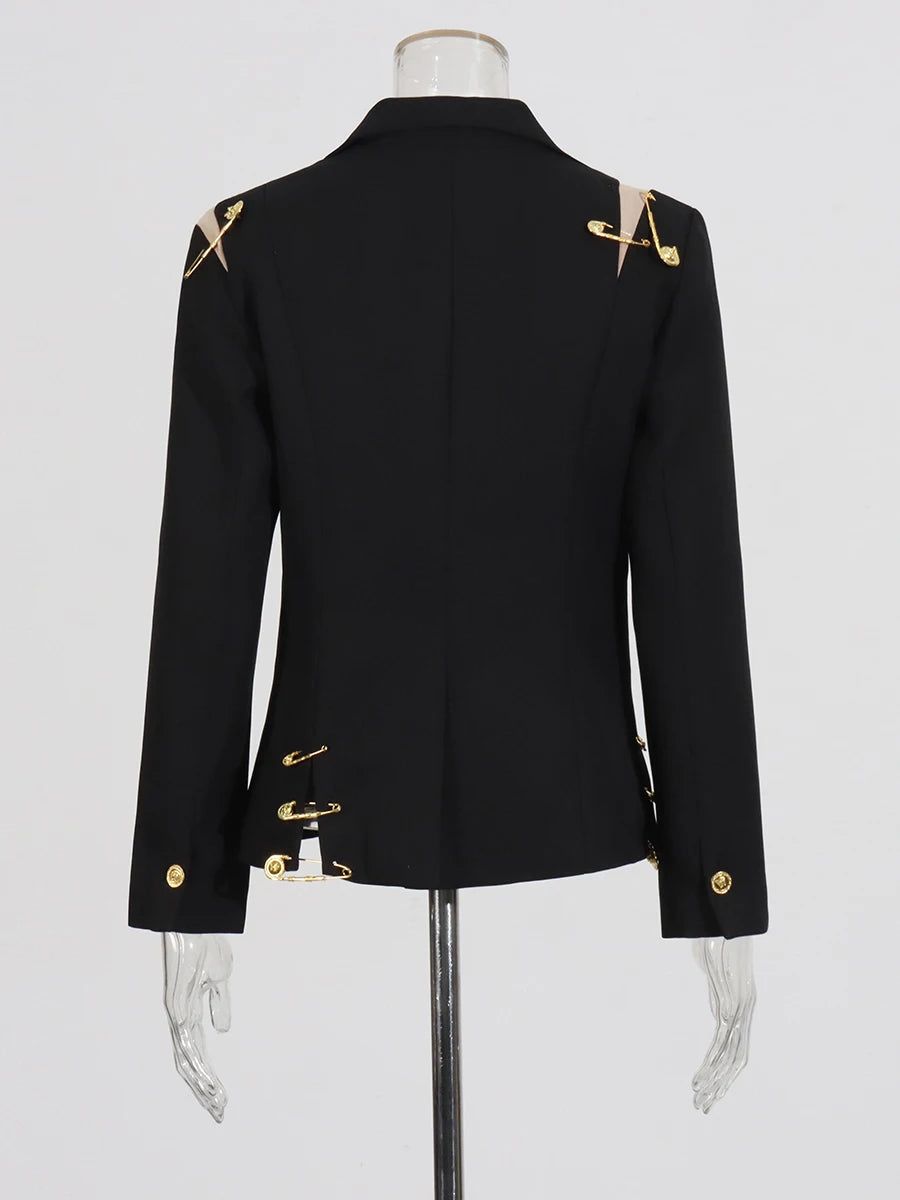 Black blazer with gold buttons on a mannequin against a white background