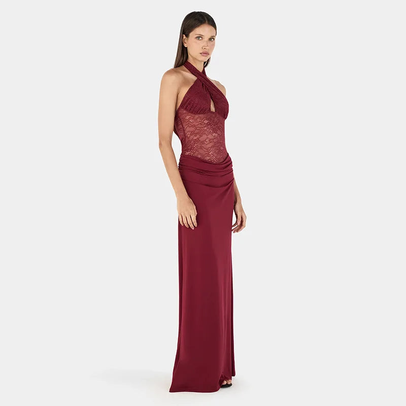 Side view of halter neck maxi dress with burgundy lace bodice and burgundy skirt