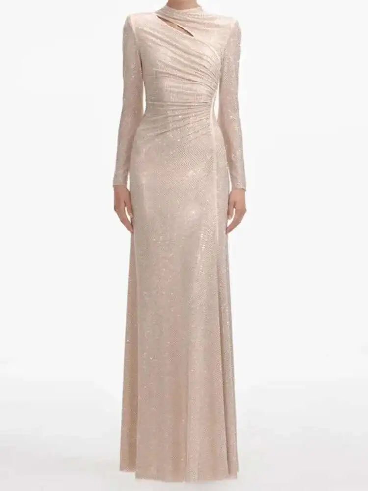 Apricot evening gown with long sleeves on a white background