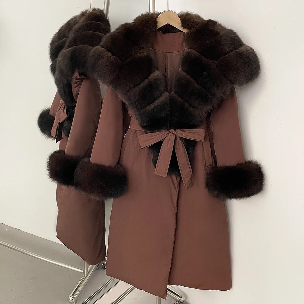 Brown coat with fur trim on a hanger 