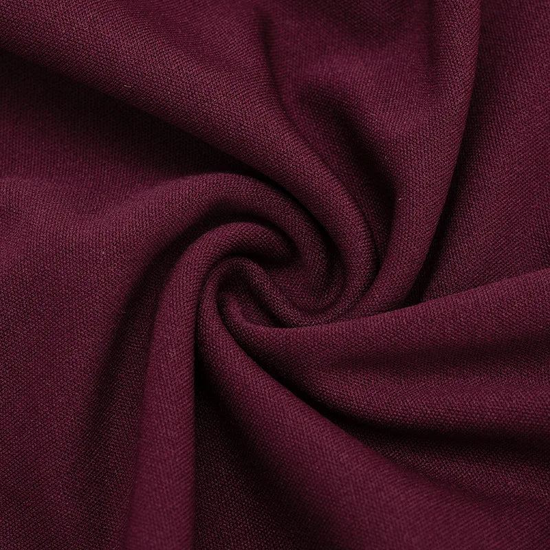 Close-up of dark purple fabric with folds