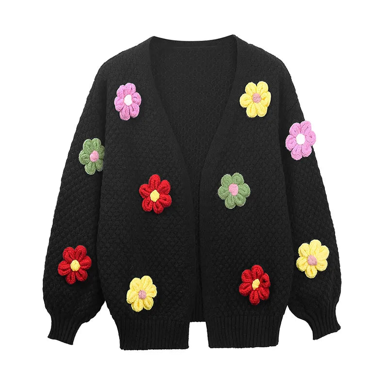 Black knit cardigan with scattered floral appliqu�s