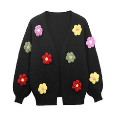 Black knit cardigan with scattered floral appliqu�s