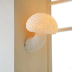 Close-up of the Golden Atelier White Mushroom Wall Sconce, highlighting its whimsical mushroom shape and white finish. 1