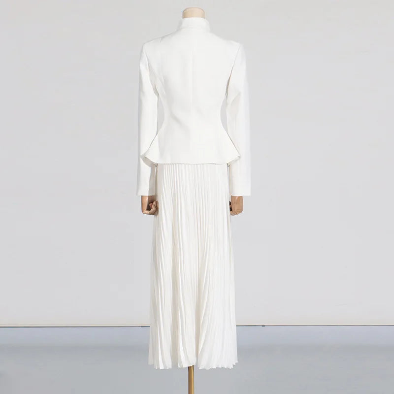Mannequin wearing a white outfit with a plain background