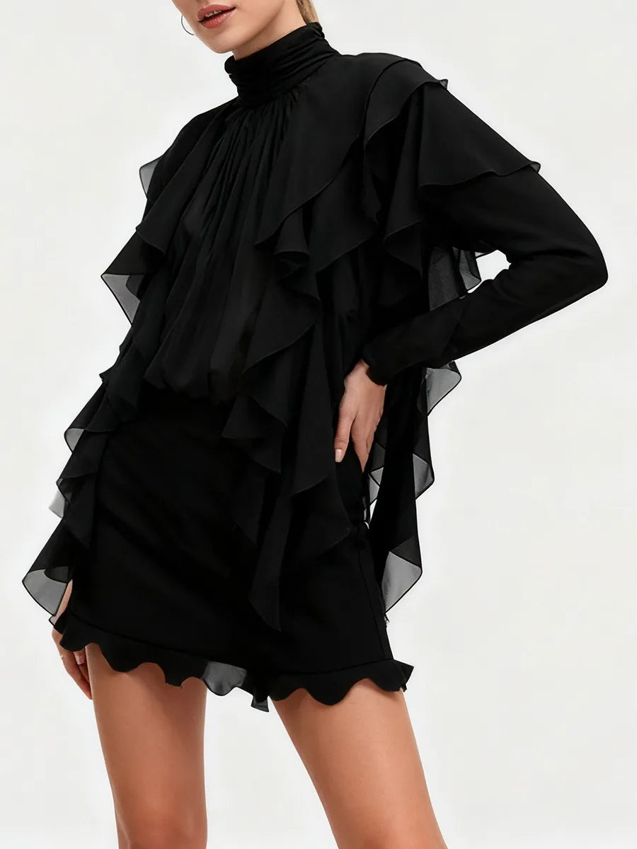 Black ruffled dress on a white background