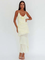 Light yellow spaghetti strap maxi dress with rose embellishment and ruffles
